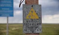 Radioactive warning sign at the Semipalatinsk nuclear test site, Kazakhstan. Photo by Magdalena Stawkowski