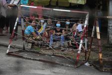 Myanmar people waiting outside prison