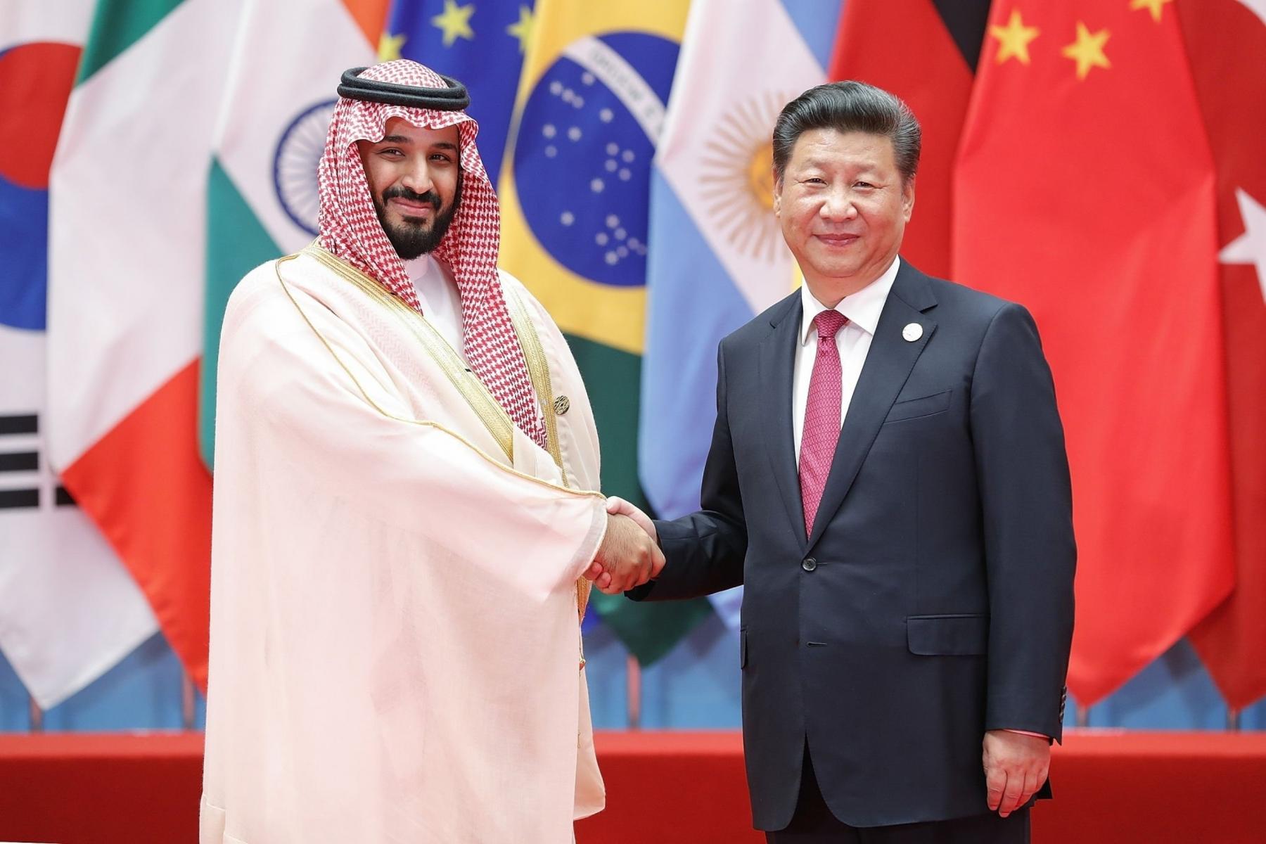 Chinese President Xi Jinping (right) shakes hands with Saudi Deputy Crown Prince and Minister of Defense Mohammed bin Salman bin Abdulaziz Al Saud to the G20 Summit on Sep 4, 2016 in Hangzhou, China.