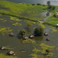 flooded homes within a village after the River Nile broke the dykes in Jonglei State, South Sudan, October 5, 2020.